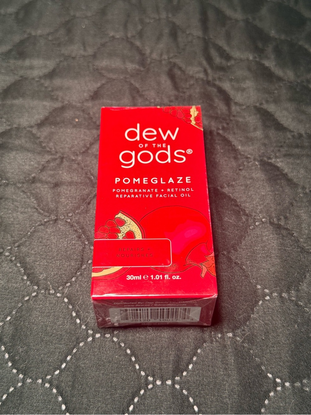 Dew of the Gods Pomeglaze Reparative Facial Oil — Red